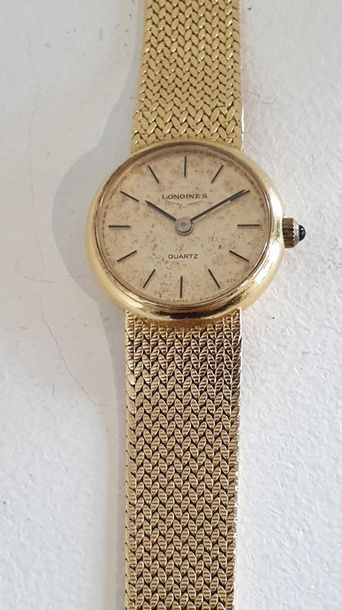 null LONGINES circa 1950
Ladies' watch in 18 K yellow gold
Round case, smooth bezel,...
