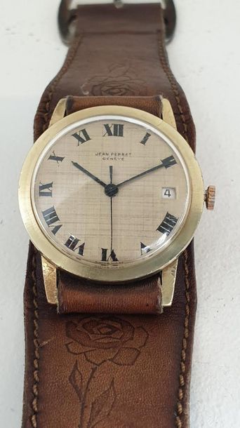 null Jean PERRET Geneva circa 1975.
Gold-plated wristwatch, round case, smooth bezel,...