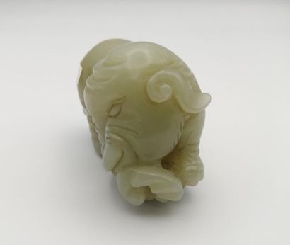 null CHINA, early 20th century. Celadon jade elephant. The animal is depicted standing,...