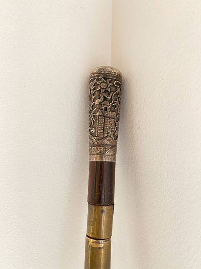 null 
Indochine ou Chine du sud, circa 1900. 






Canne épée au pommeau en argent...