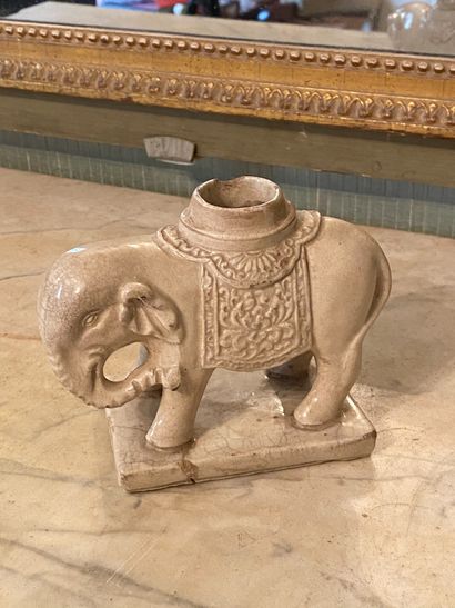 null 
China, 19th and 10th century. 

Incense-holder showing an elephant standing...