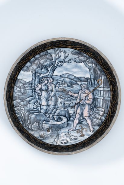 null 
Small enamel bowl painted in greyish enamel with gold and rose highlights depicting...