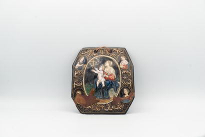 null 
Octagonal plaque depicting the Virgin and Child in front of the cross; frame...