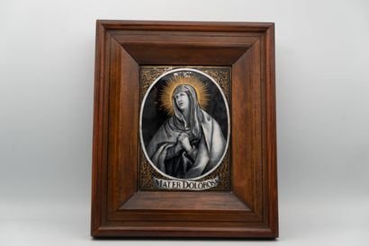 null 
Two enamel plaques painted in grisaille with gold highlights depicting in medallions...