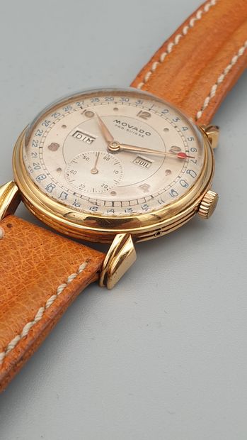 null MOVADO, Triple date, ref. 4820 n°493105 circa 1940.

Wristwatch in 18K yellow...