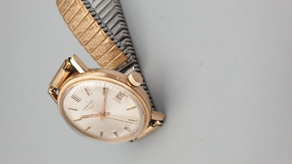 null LONGINES circa 1965.

Round gilt metal case, smooth bezel, silver dial with...