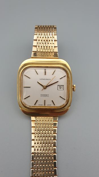 null LONGINES "Comet" circa 1974.

Large rectangular gilt metal case. 

Sighted crown...