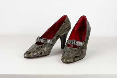 null 
YVES SAINT LAURENT


Pair of grey python strappy pumps. Red leather interior....