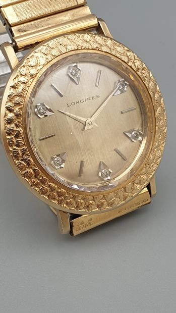 null LONGINES " Discovolante" ref.R6028, vers 1965

Montre bracelet de dame en or...