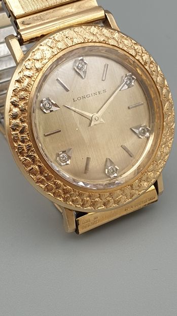 null LONGINES " Discovolante" ref.R6028, vers 1965

Montre bracelet de dame en or...