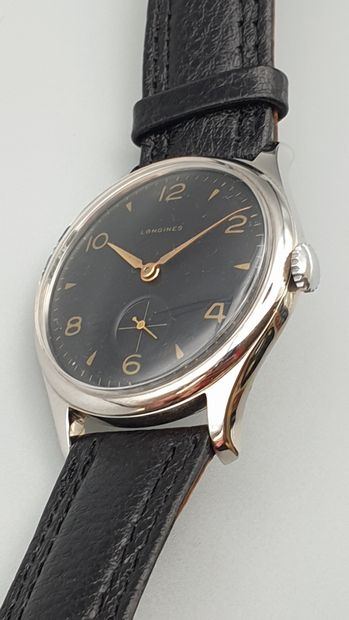 null LONGINES "JUMBO" vers 1955.

Elegante montre bracelet en acier, boitier tonneau...
