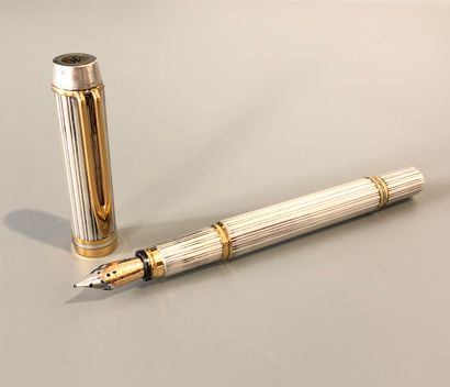 null 
WATERMAN - Silver fountain pen (800 thousandths) and gilded silver worked with...