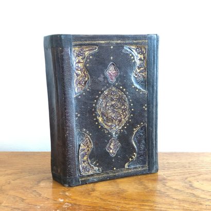 null Nineteenth-century calligraphic Qur'an in a contemporary cover binding on parchment....