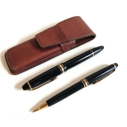 null MONT BLANC

Lead holder and fountain pen in 14 carat gold with black resin and...