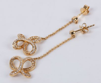 null PAIR OF EARRINGS in yellow gold 18K (750 thousandths) decorated each one with...