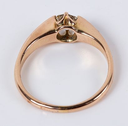 null Ring in pink gold 14K (585 thousandths) decorated with a diamond of old size...