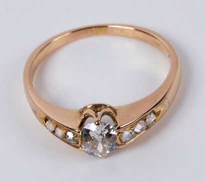 null Ring in pink gold 14K (585 thousandths) decorated with a diamond of old size...