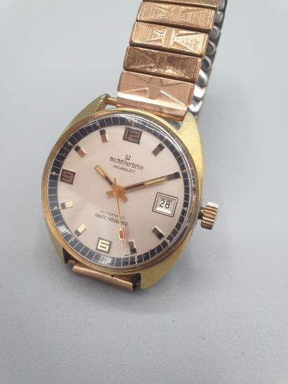 Michel HERBELIN Ref.6179 vers 1970. 

Montre bracelet en métal doré, boitier tonneau...