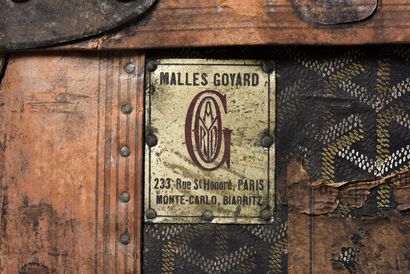 GOYARD Malle cabine rectangulaire en toile Goyardine noire et cuir naturel. Garniture...