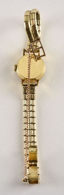 OMEGA ref. 10985-61 vers 1961. Montre de dame en or jaune 18k. Boitier rond, cornes...