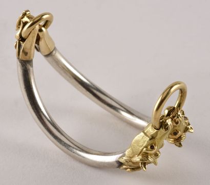 null Rigid bracelet opening in yellow gold 18K (750 thousandths) and silver (925...