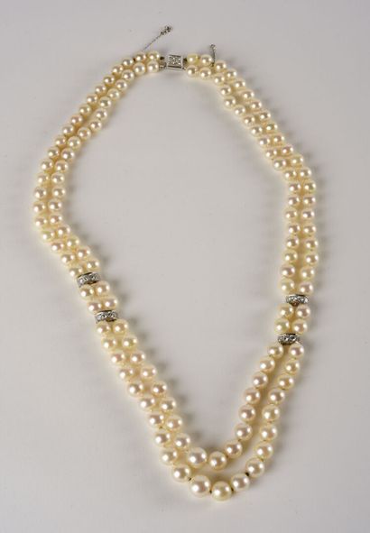 null Necklace made up of two rows of white cultured pearls in fall decorated with...