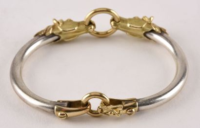 null Rigid bracelet opening in yellow gold 18K (750 thousandths) and silver (925...