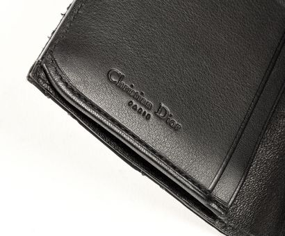 CHRISTIAN DIOR Black nylon double-sided wallet with cane pattern and silver metal....