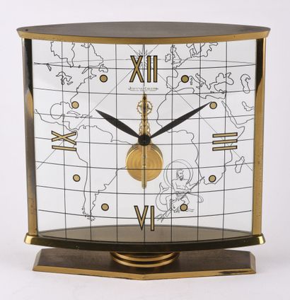 JAEGER-LECOULTRE About 1950. Desk clock of square shape in gilded brass. Skeleton...