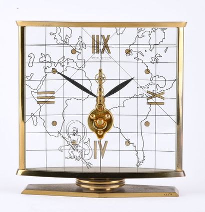 JAEGER-LECOULTRE About 1950. Desk clock of square shape in gilded brass. Skeleton...