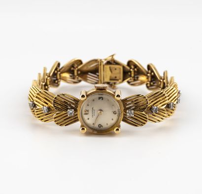 UNIVERSAL Genève,ref.16583 vers 1950 Élégante montre de dame en or jaune (750) et...