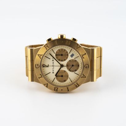 BULGARI Montre-bracelet chronographe en or (750). 

Cadran blanc, index appliques...