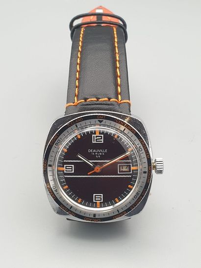 DEAUVILLE "GMT" vers 1975. Montre bracelet en acier, boitier coussin, lunette GMT...