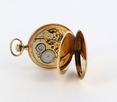 ZENITH vers 1920 Élégante montre de poche en or jaune 750°, boitier rond à deux charnières,...