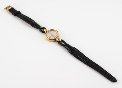 JUVENIA Yellow gold (750) ladies' wristwatch. 

Circular case signed and numbered,...