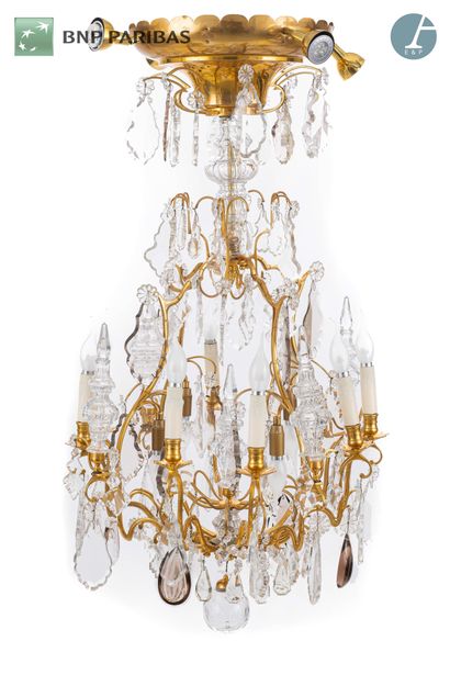 null Cage chandelier in the Louis XV style, with eight arms of light in chased and...