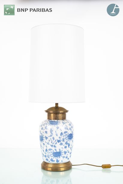 null Pair of white porcelain lamps with blue and white decoration.
Accidents and...