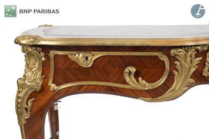 null Flat desk in satinwood and violet wood, the moving belt opening to three drawers...