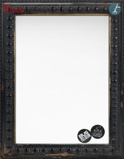 null From the Palladium Bus

Mirror, carved and black lacquered wood frame, decorated...