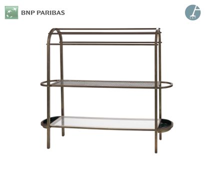 null In the modernist taste,
Shelf, in brass, with two trays, one in glass and the...