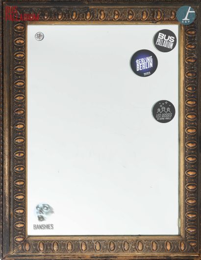 null From the Palladium Bus

Mirror, carved and patinated wood frame, decorated with...