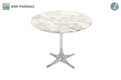 null Circular table,
Cruciform base in chromed metal, the grey veined white marble...