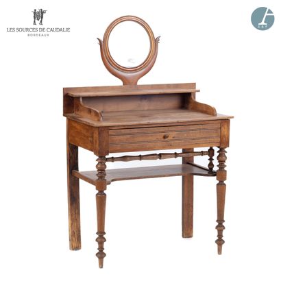 null From the Sources de Caudalie
Dressing table in natural wood, opening with a...