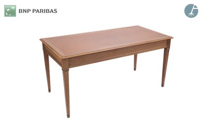 null Table in molded and carved natural wood, the rectangular top covered with Camel...
