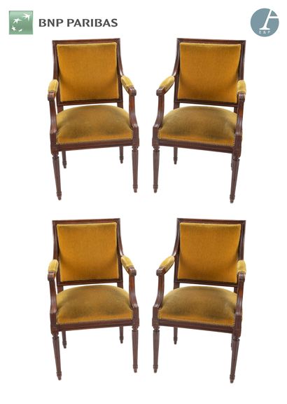 null Set of four armchairs in natural wood molded and carved. Yellow velvet upholstery....
