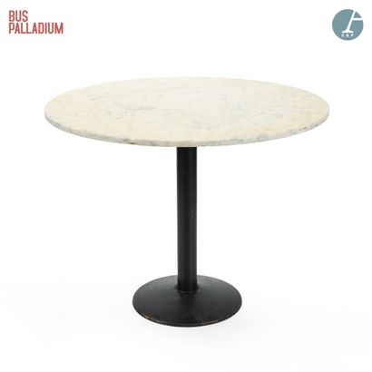 null From the Palladium Bus

A round table, the top in white marble veined gray,...