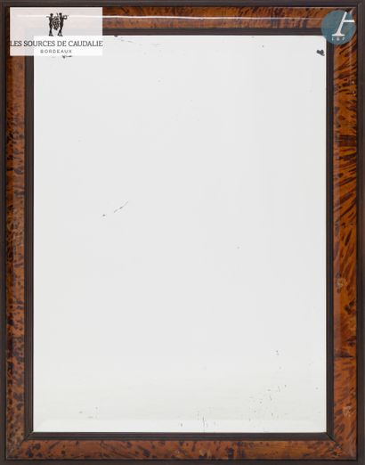 null From the Sources de Caudalie
A large mirror with a magnifying glass frame
H...