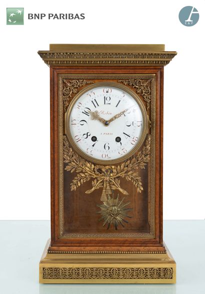 null Clock in burr wood and gilt bronze, decorated with laurel leaves, stylized foliage...