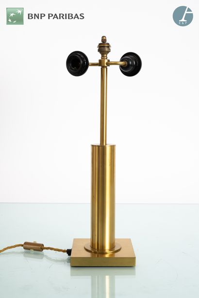 null Pair of lamps,
the cylindrical shaft in gilded metal resting on a square base.

H...