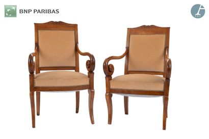 null Suite of two armchairs in molded and carved mahogany, the rectangular backrest...